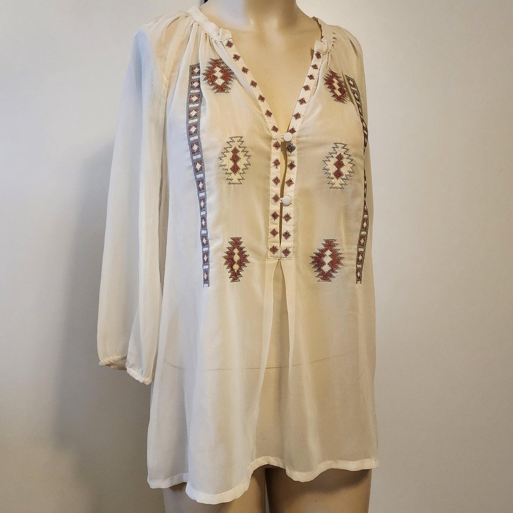 Beige sheer top by Costa Blanca Collection, southwest theme embellishments
